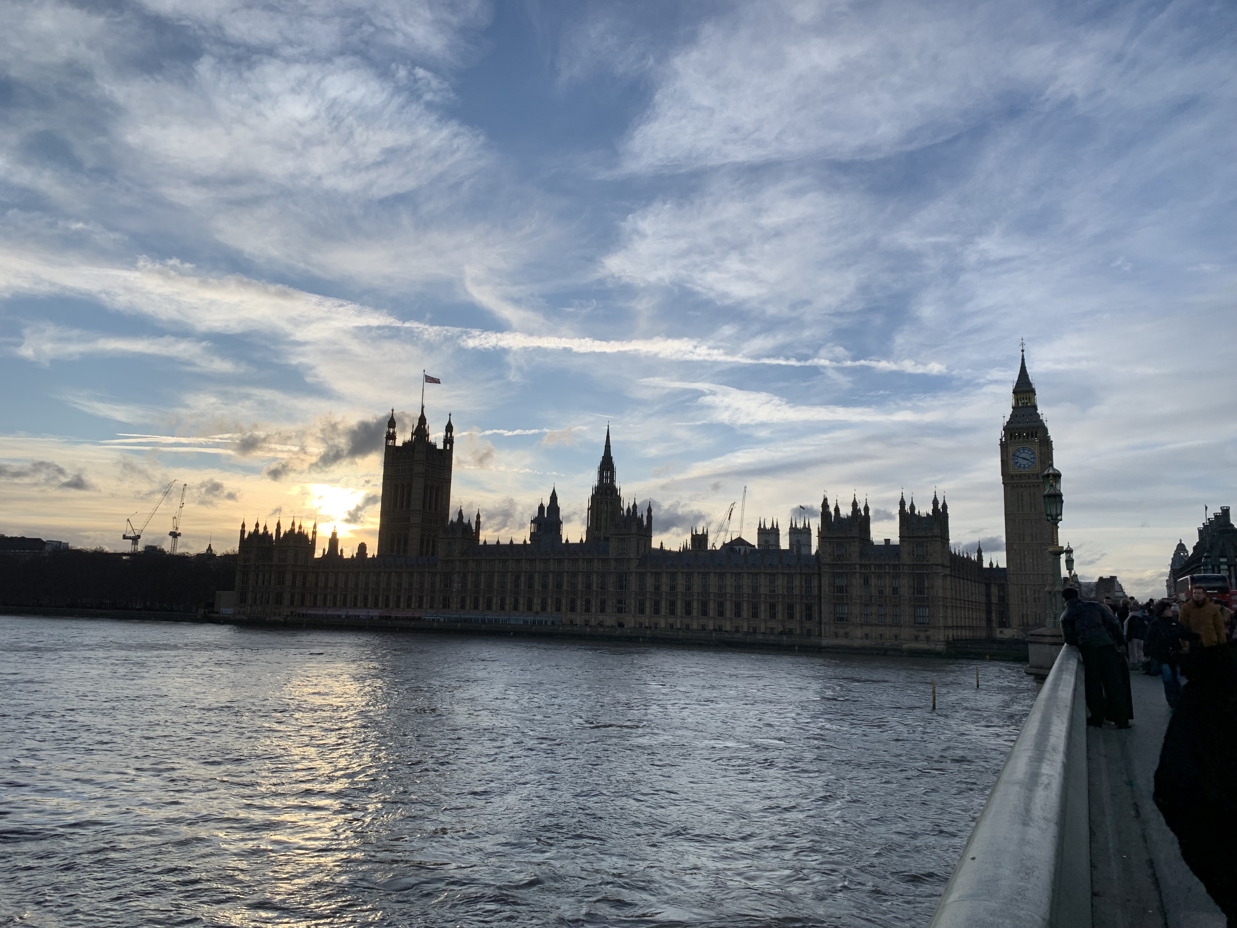 Big Ben and the Speaker's House, lit by the setting sun
